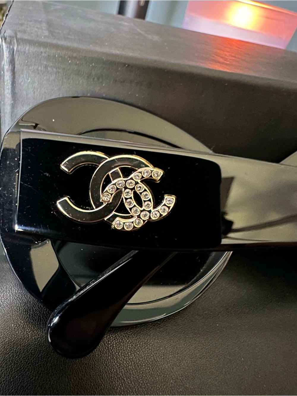 CHANEL Black Oval Sunglasses with Gold Logo Accent - Picture 4 of 6